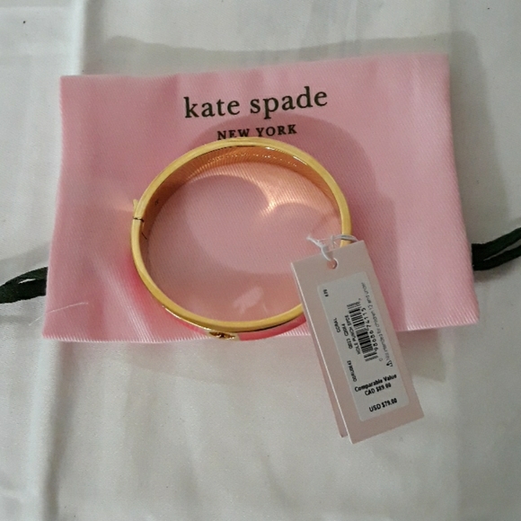 kate spade Jewelry - Kate Spade "hole punch spade" Coral Hinge Bangle